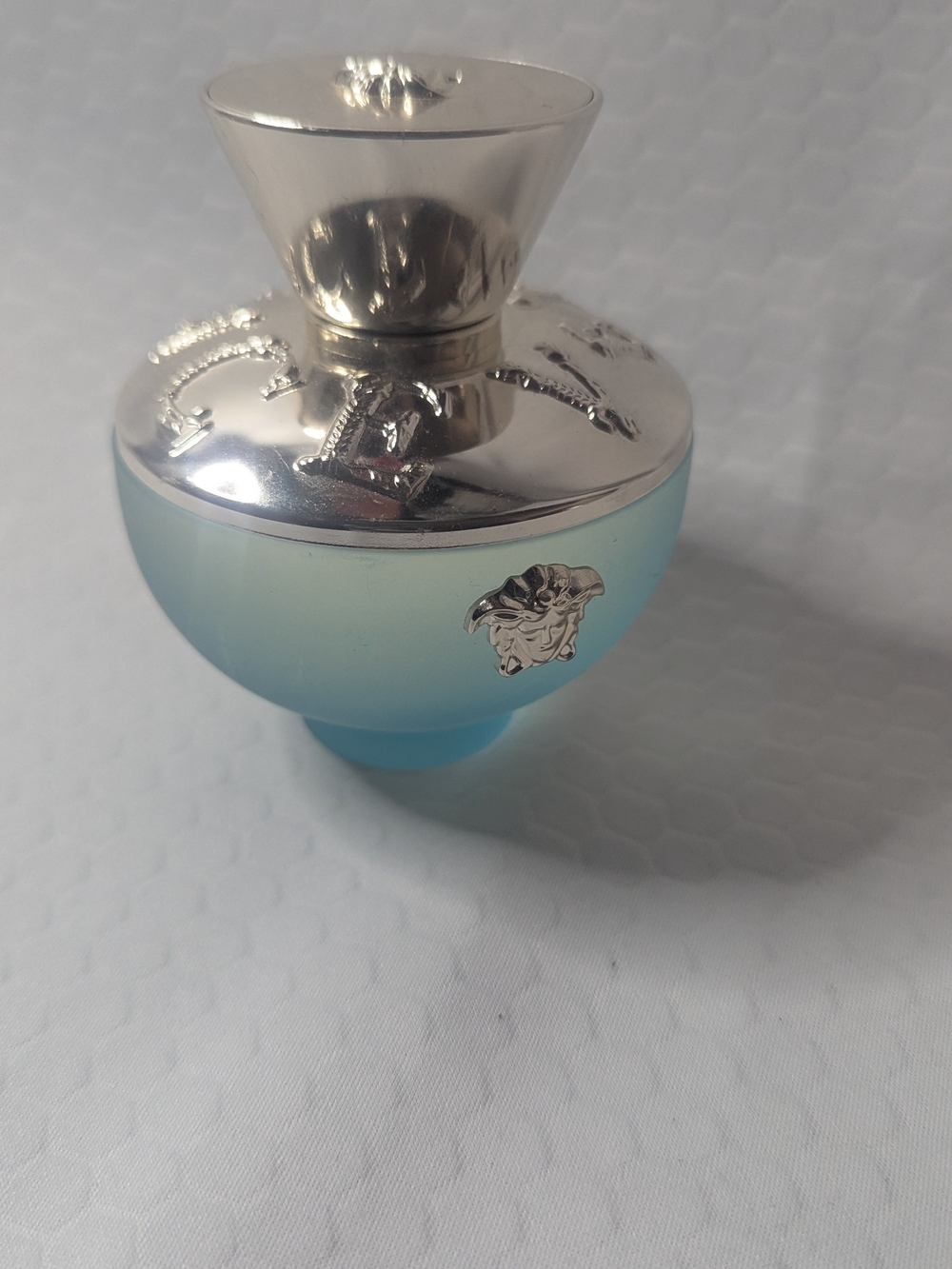 Versace Aqua Blue Gradient Perfume Bottle with Gold Accents